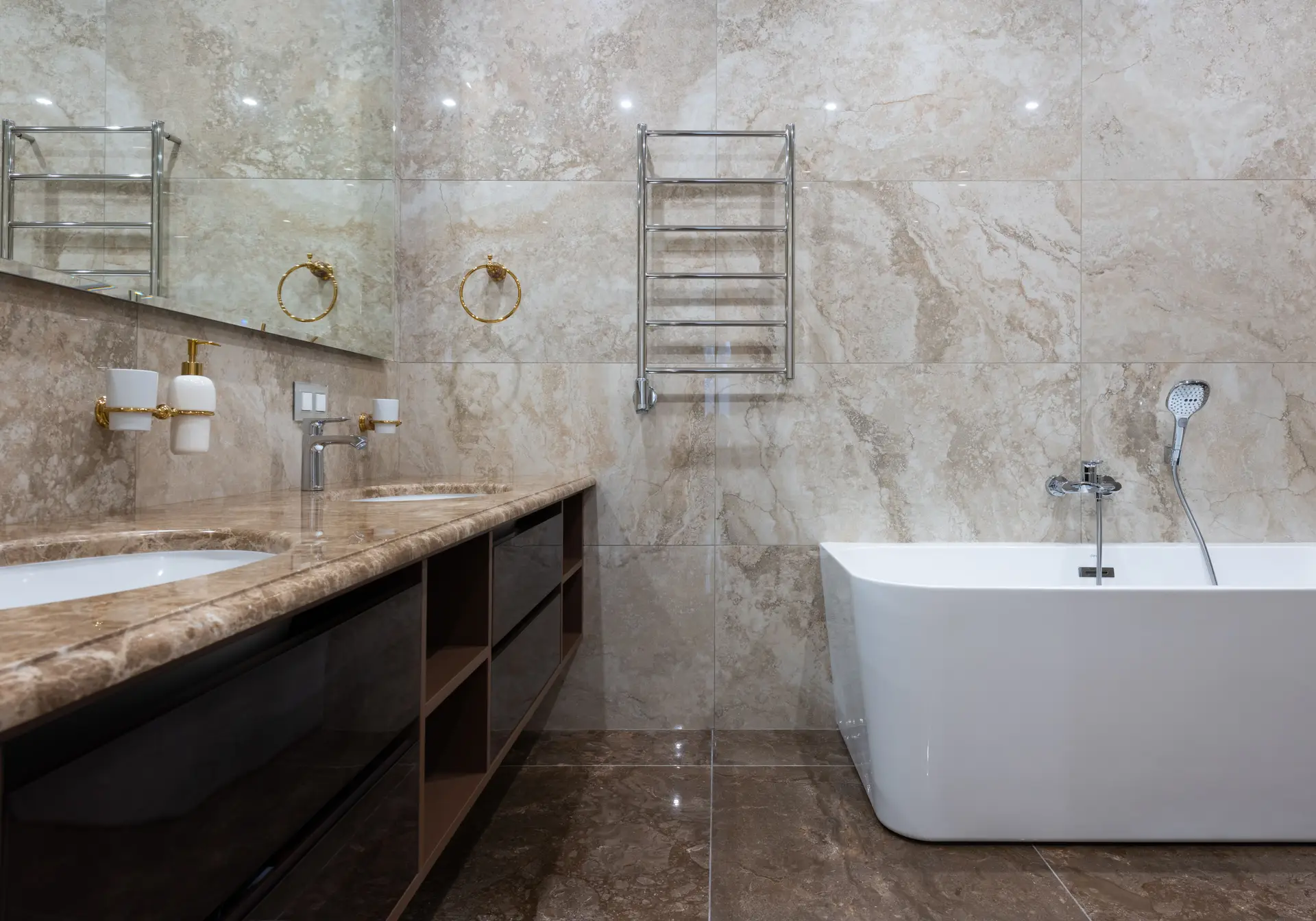 Contemporary open kitchen with dramatic Calacatta marble waterfall island and ambient joinery