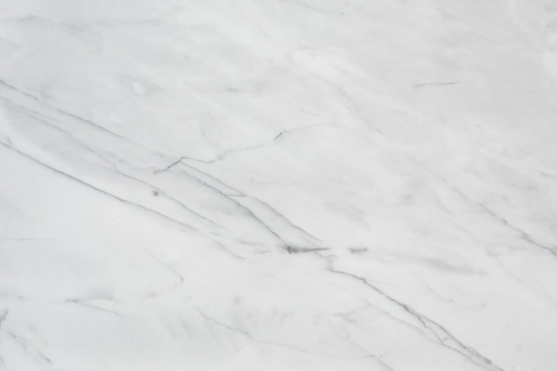 Fine veined stone architectural interior with natural raking light