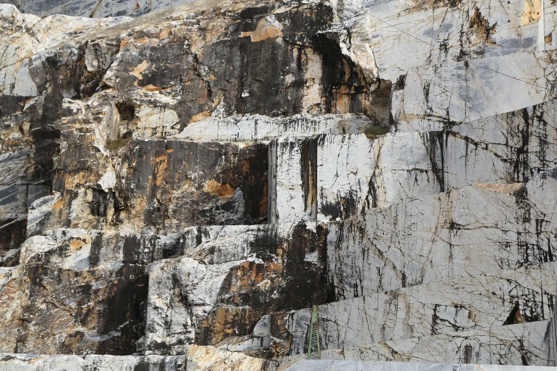 Authentic stone quarry cut with layered sediment strata