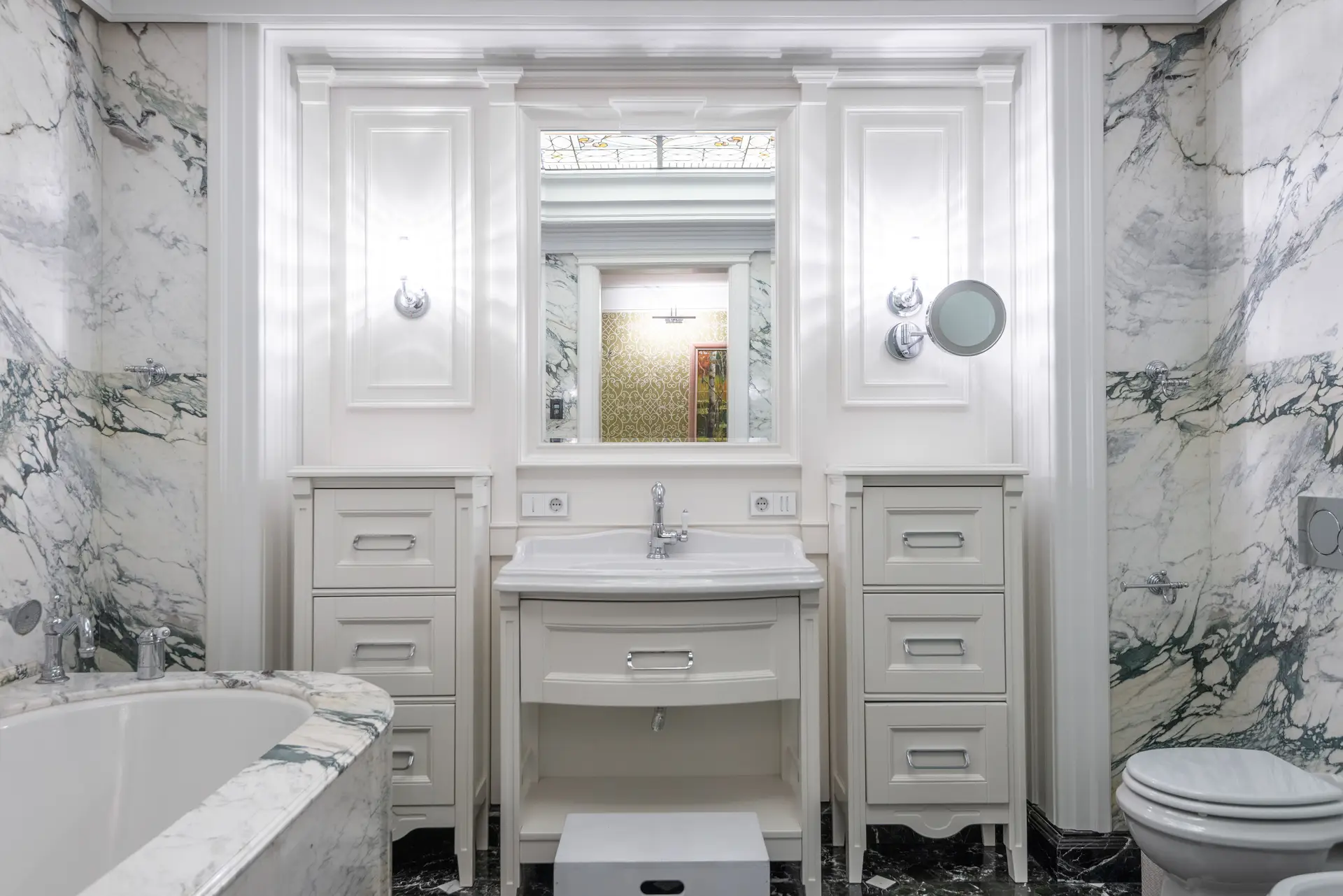 Minimalist bathroom design with full height Italian marble cladding