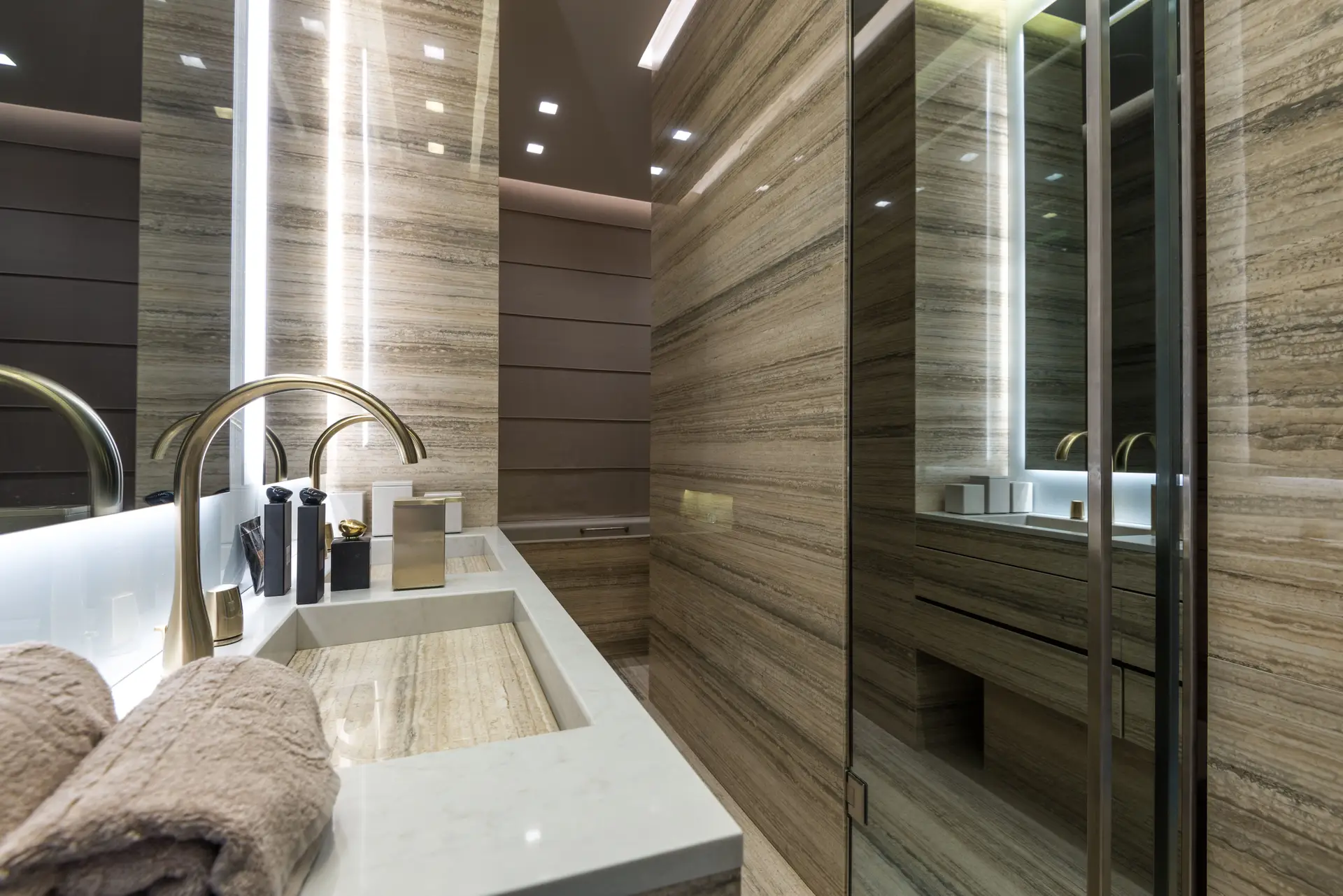Seamless marble and stone application in an interior bathroom